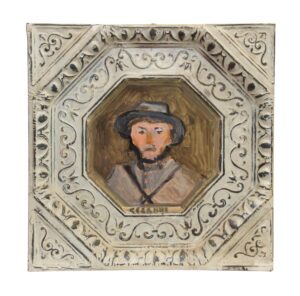 Hand-painted portrait panel on antique tin with an ornate border and a central bust of a man in a hat.