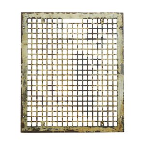 Rectangular cast iron wall grate with a dense square grid, surface rust, and mounting holes around the edges.