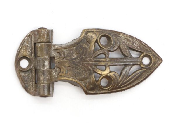 Antique Art Nouveau offset ice box hinge in nickeled bronze, shown in a close-up with ornate pierced detailing and mounting holes visible.