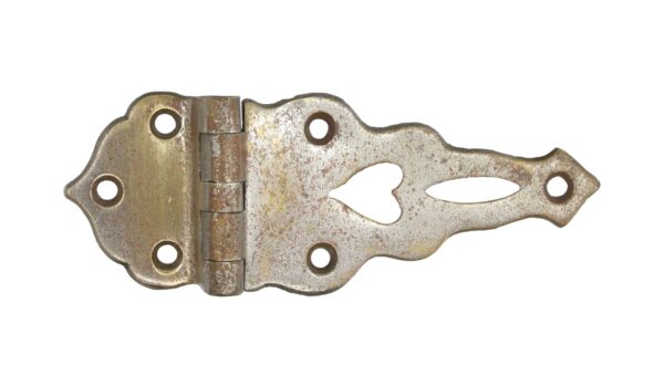 Antique nickel-plated bronze ice box hinge with five screw holes and a decorative cutout on the longer leaf.