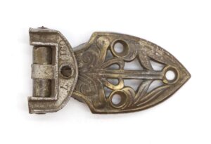 Art Nouveau offset ice box hinge with an ornate pierced backplate and visible hinge barrel, shown in close-up from the front.