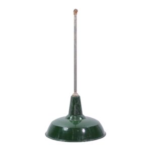 Industrial pendant light with a green enameled steel shade and long pole, shown from the side with visible rust and wear.
