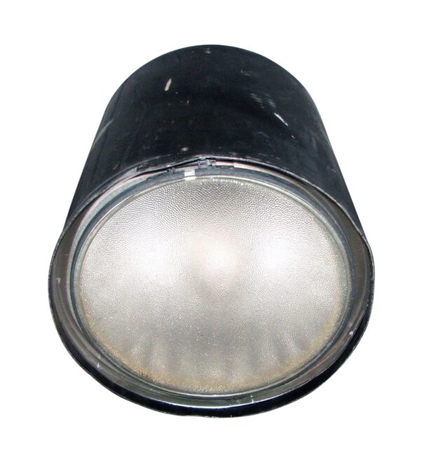 Industrial cylinder light with a pebbled Fresnel lens shown in a front view.
