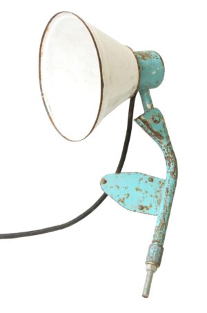 Vintage industrial desk light with a white shade and distressed blue mount, shown in side view with the cord and threaded mounting end visible.