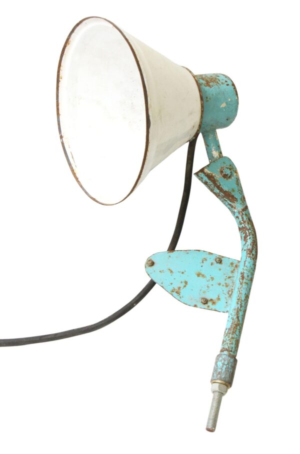 Vintage industrial desk light with a white shade and distressed blue mount, shown in side view with the cord and threaded mounting end visible.