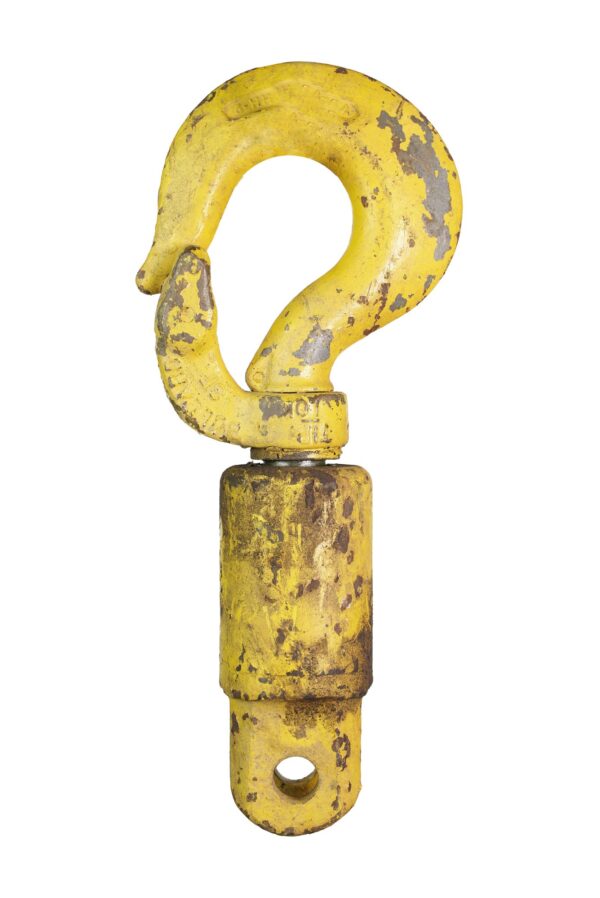 Yellow steel hook with a looped top and mounting base, shown with chipped paint and visible wear.