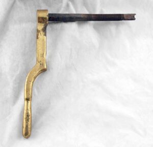 Polished brass door lever shown in profile, with a threaded mounting stem extending to the right.