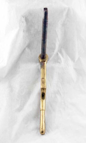 Polished brass door lever shown vertically with the threaded stem visible at the top.