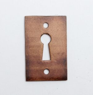 Antique brass keyhole cover plate with a keyhole cutout and two mounting holes.