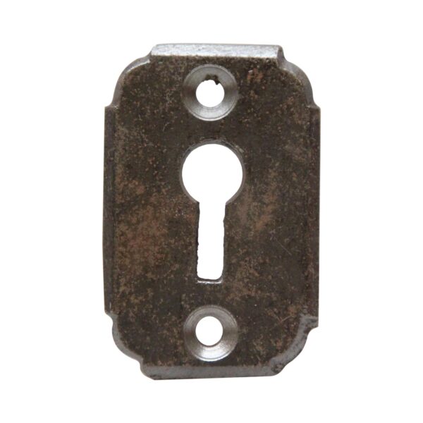 Black cast iron door keyhole cover with rounded corners and two mounting holes.