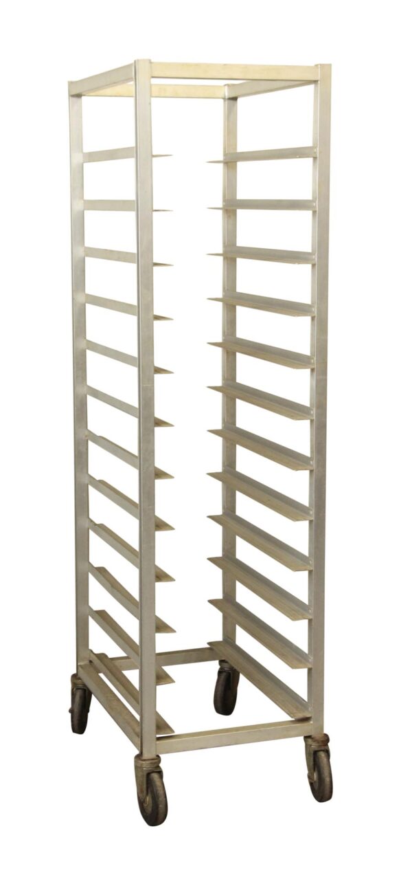 Tall aluminum sheet pan cart with multiple tray slots and four heavy duty rubber casters.
