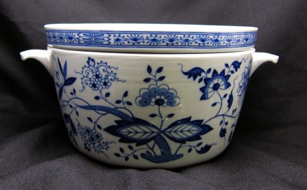 Ceramic soup pot with two side handles and a blue floral pattern on a white background.
