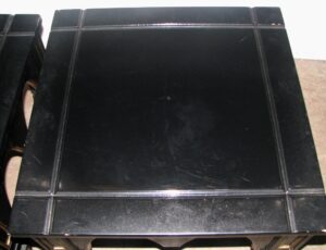 Black Gothic square end table with gold details, shown from above.