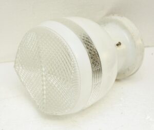 Semi flush mount light with a white and clear glass shade and white fitter shown in close-up.
