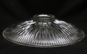 Clear ribbed glass pendant light shade with a domed Holophane-style form and threaded top opening, shown from the side.
