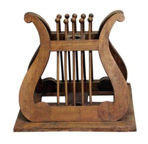 Carved wooden music or book stand with a medium wood tone and decorative curved side panels.