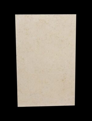 Tan marble slab with a lightly mottled surface shown front on.