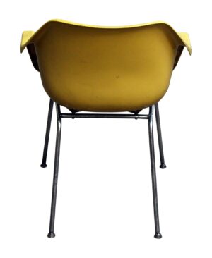 Yellow molded plastic chair with chrome frame shown from the back, featuring a curved shell seat and slender metal legs.