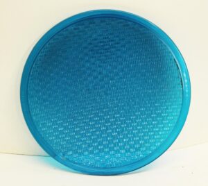Round blue glass panel with a textured convex surface and smooth rim.