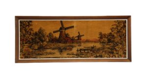 Wood-framed fabric wall art showing a Holland scene with windmills in brown and orange tones.