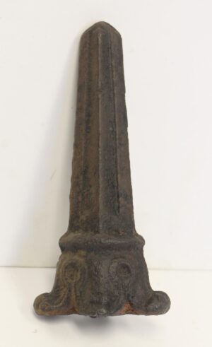 Art Deco cast iron finial with a tapered top and flared base, shown vertically on a white background.