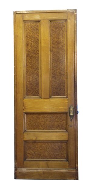 Wooden pocket door with four panels and a vertical inset handle on the right side, shown with medium and dark wood tones.