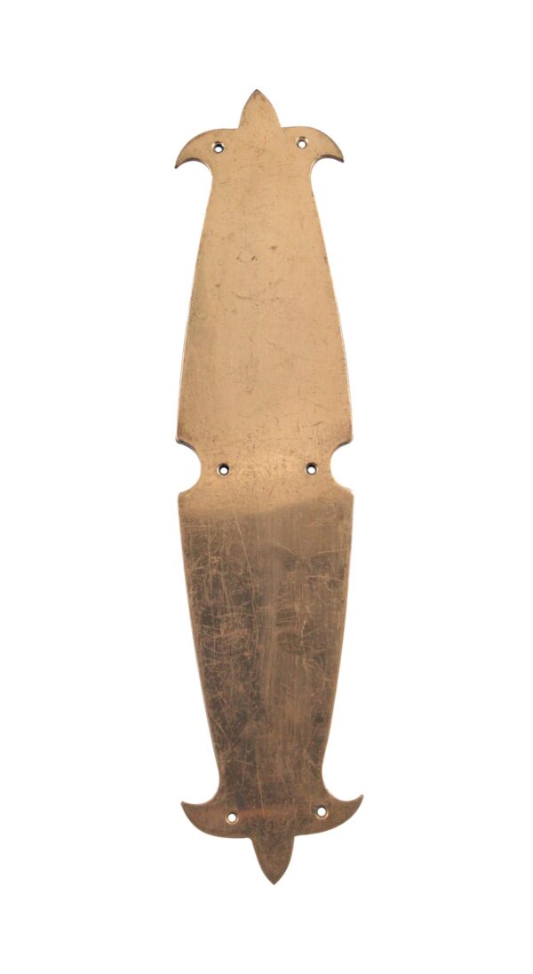 Vintage mid century polished brass door push plate with a tapered shape and four mounting holes, shown vertically.