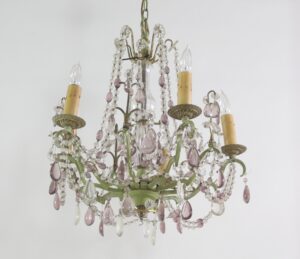 Italian five-arm chandelier with a muted green frame, candle-style sockets, and hanging clear and amethyst crystal beads and teardrop pendants.
