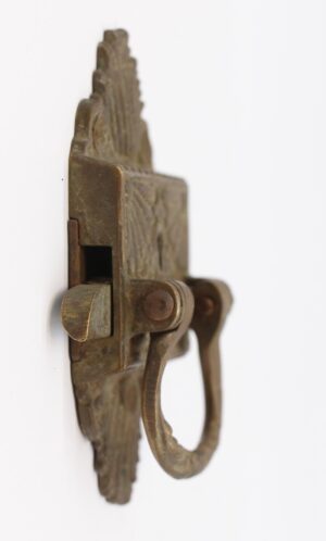 Art Nouveau right-swing latch in antique bronze, shown in side view with an ornate plate and ring pull.