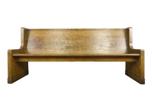 Vintage oak bench with a simple backrest and broad side supports, shown front view with visible surface wear in a dark wood tone.