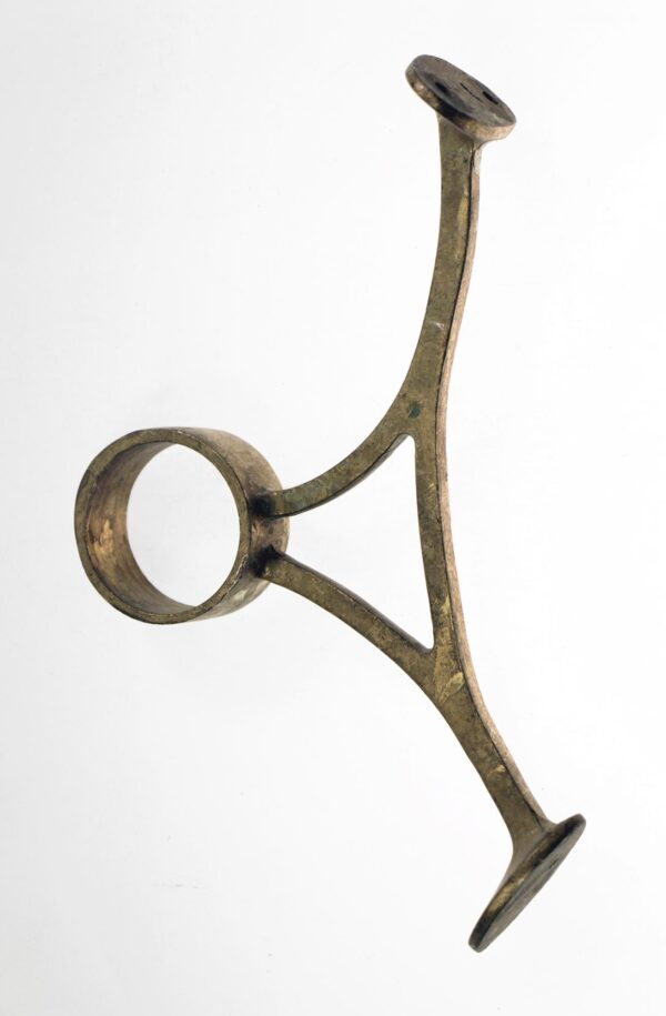 Curved brass banister bracket with a circular rail ring and dual mounting plates, shown in a side view.