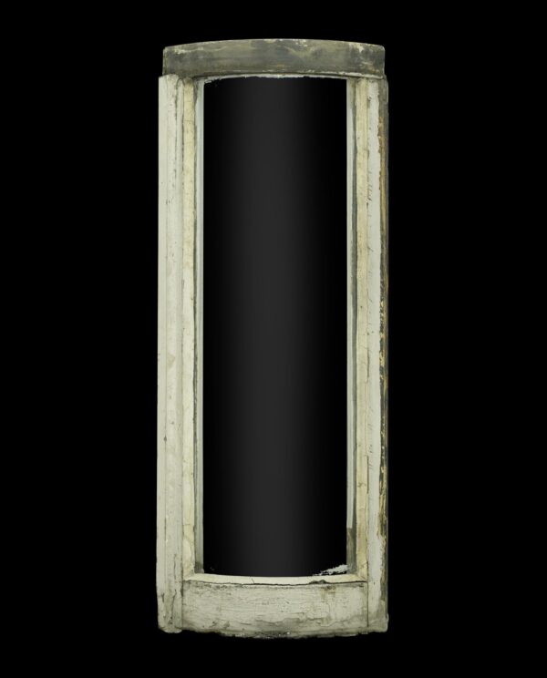 Curved pine sash window frame with white painted finish and visible age wear.