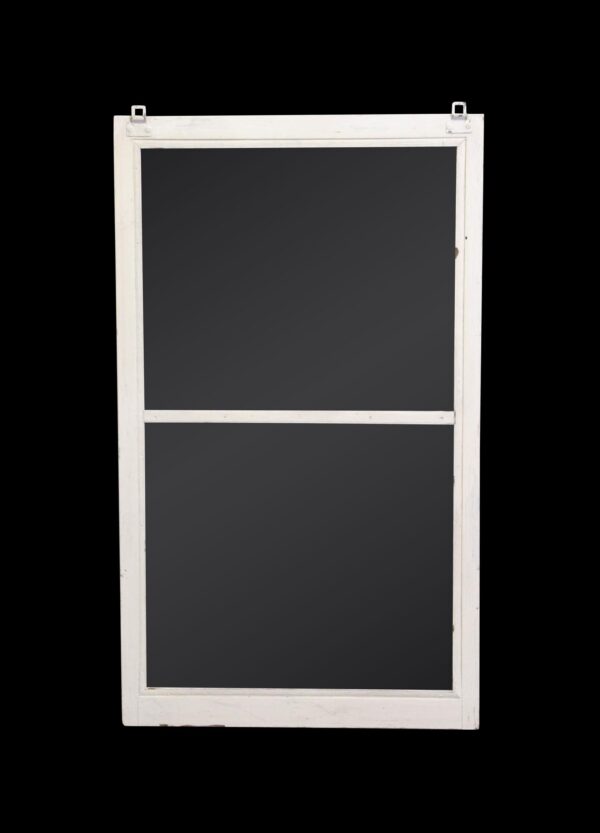 White wooden window screen with two stacked panels and a visible metal hanger at the top.