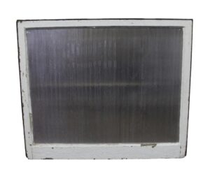 Vintage window with a painted white wood frame and original rippled clear glass.