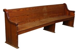 Extra long oak pew with a simple slatted back, dark wood tone, and end panels shown in a side view.