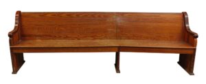 Extra long wooden pew with a simple backrest, seat, and side supports.