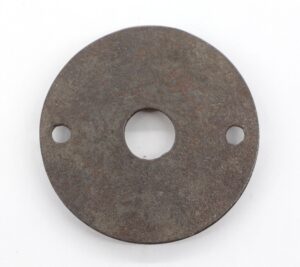 Round cast iron door rosette with a central opening and two smaller side holes, shown front on with a worn black finish.