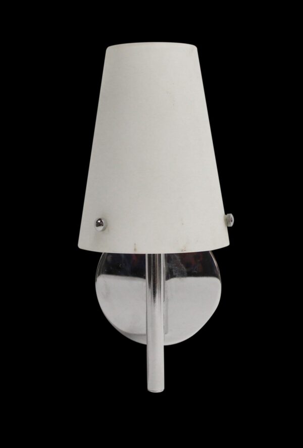 Modern white cone-shaped glass wall sconce with a chrome fixture and clear glass lower section.