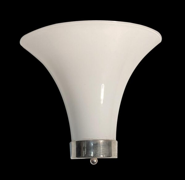 Modern white glass wall sconce with a nickel base and flared shade.