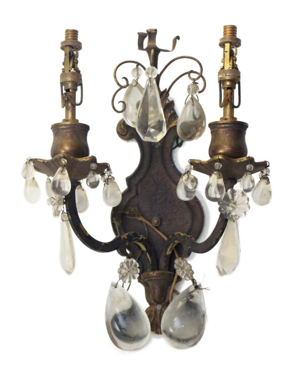 Victorian two-arm wall sconce with antique bronze finish and crystal drops, shown front view.