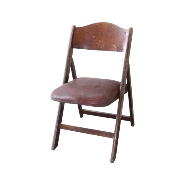 Vintage folding chair with a bentwood back and dark red vinyl seat shown at an angle.