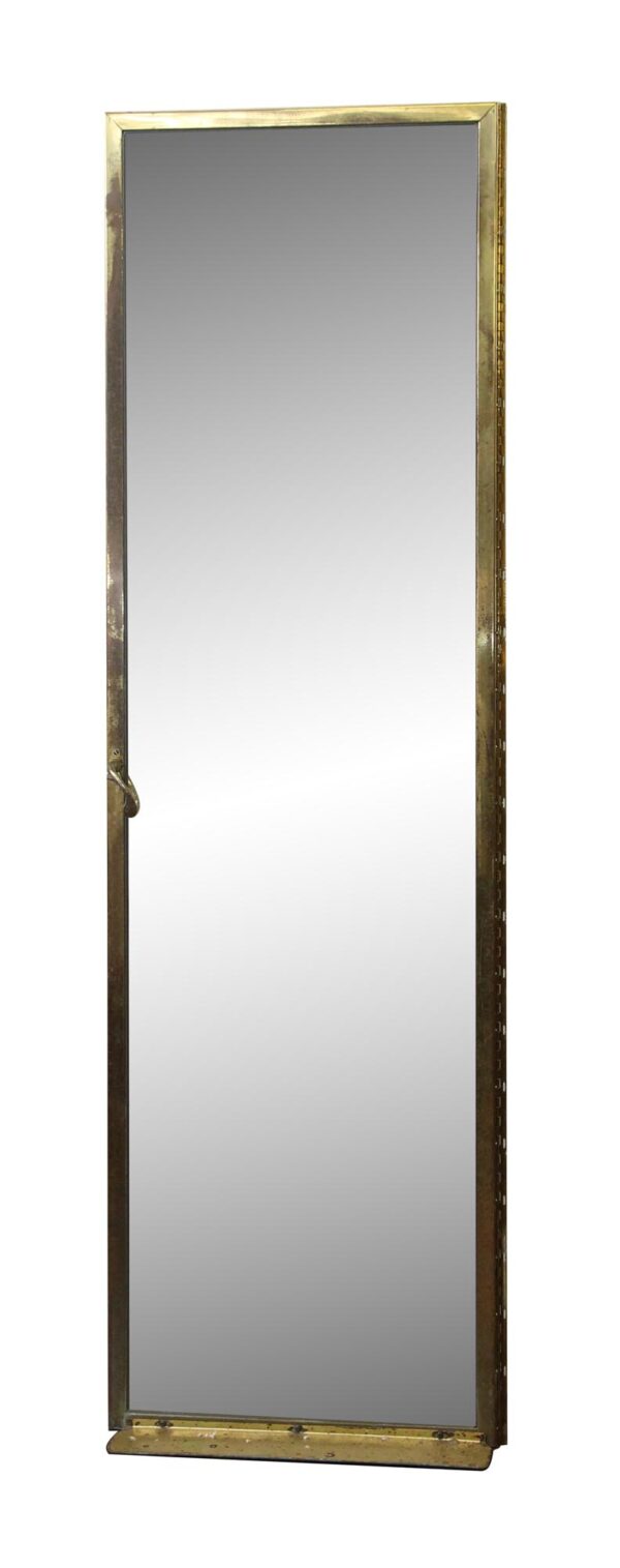 Brass-framed glass shower door shown in a full-length view, with a lever handle on the left side and hinge hardware visible along the right edge.