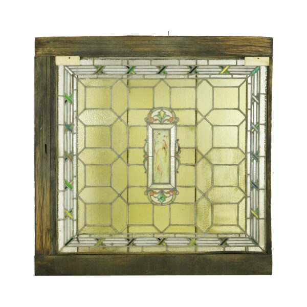 Victorian stained glass skylight with yellow panes, green accents, and a wood frame, shown front on with a central decorative panel.