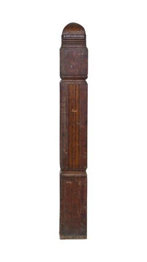 Arts and Crafts newel post in dark wood tone, shown upright with a carved rounded top and a tall rectangular shaft.