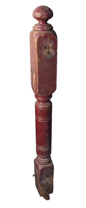 Antique traditional red painted wood newel post with a rounded top and carved base, shown in full length.
