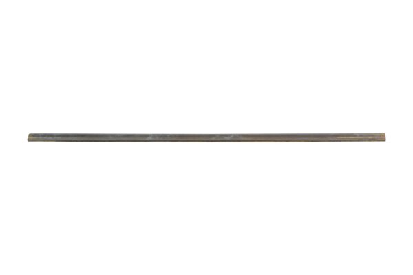 Brass beveled handrail section shown in a long horizontal view with a slightly weathered antique brass finish and subtle bends at the ends.