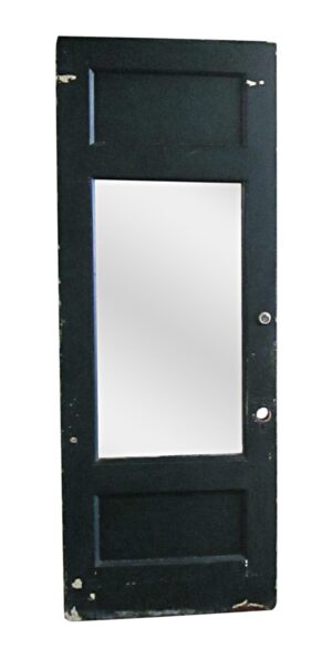 Painted wooden entry door with one large center lite and two recessed panels, shown on the dark green side.