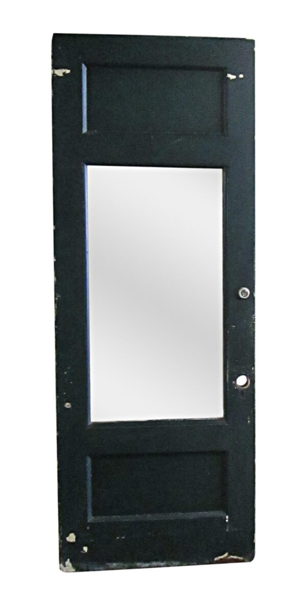 Painted wooden entry door with one large center lite and two recessed panels, shown on the dark green side.