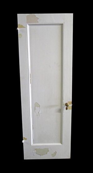 Single white wooden passage door with one vertical panel and a right-swing latch, shown in full length with visible paint wear.