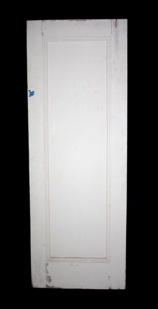 White painted wooden passage door with one vertical panel and no hardware shown.